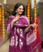 Woman wearing an embroidered cotton Anarkali set