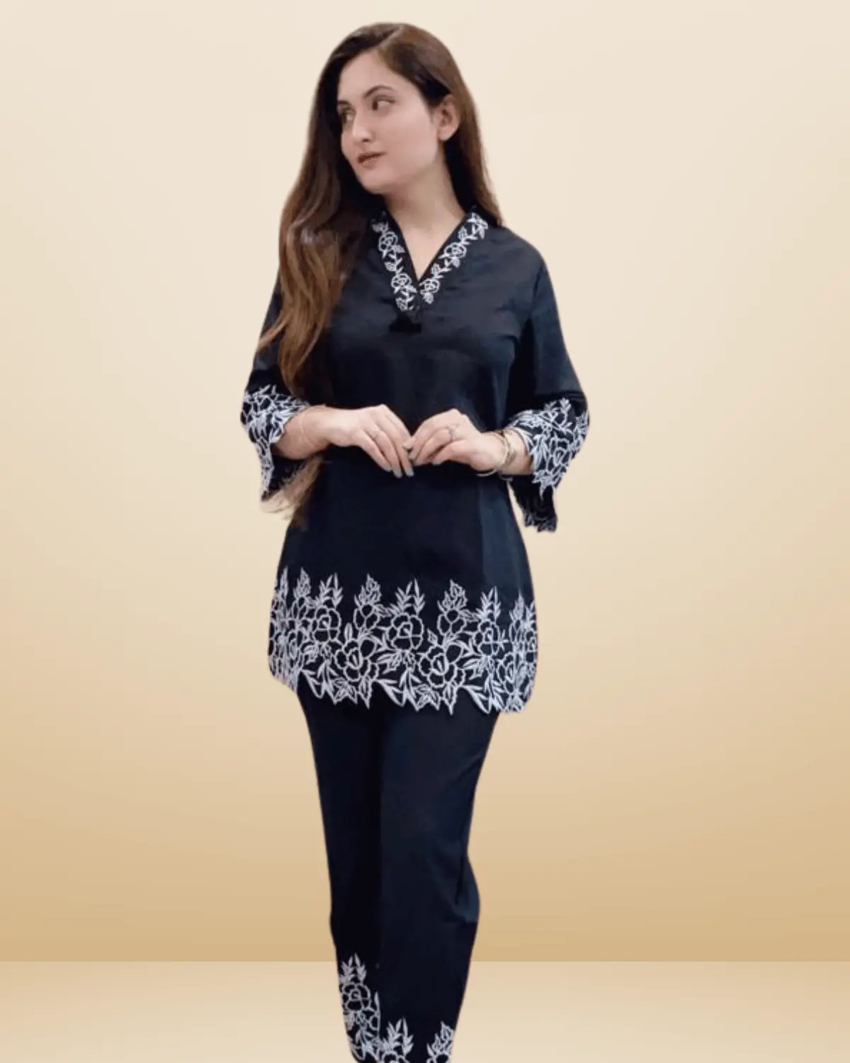 Women's ethnic kurti pant set with embroidery and sequin work – perfect for festive wear.